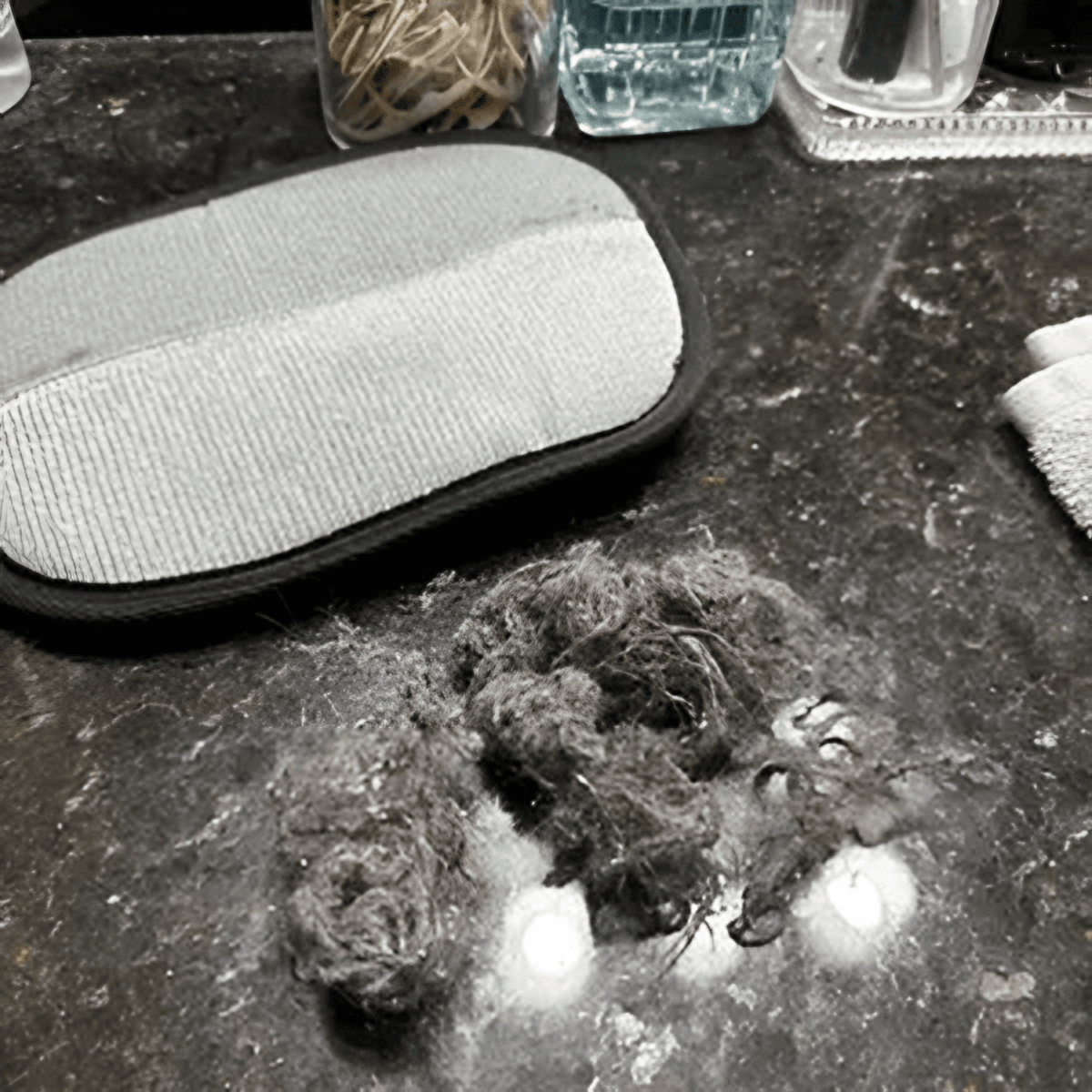 Customer photo: pile of fur pulled from a freshly vacuumed rug